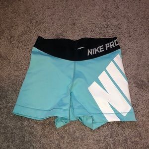 Teal nike compression shorts
